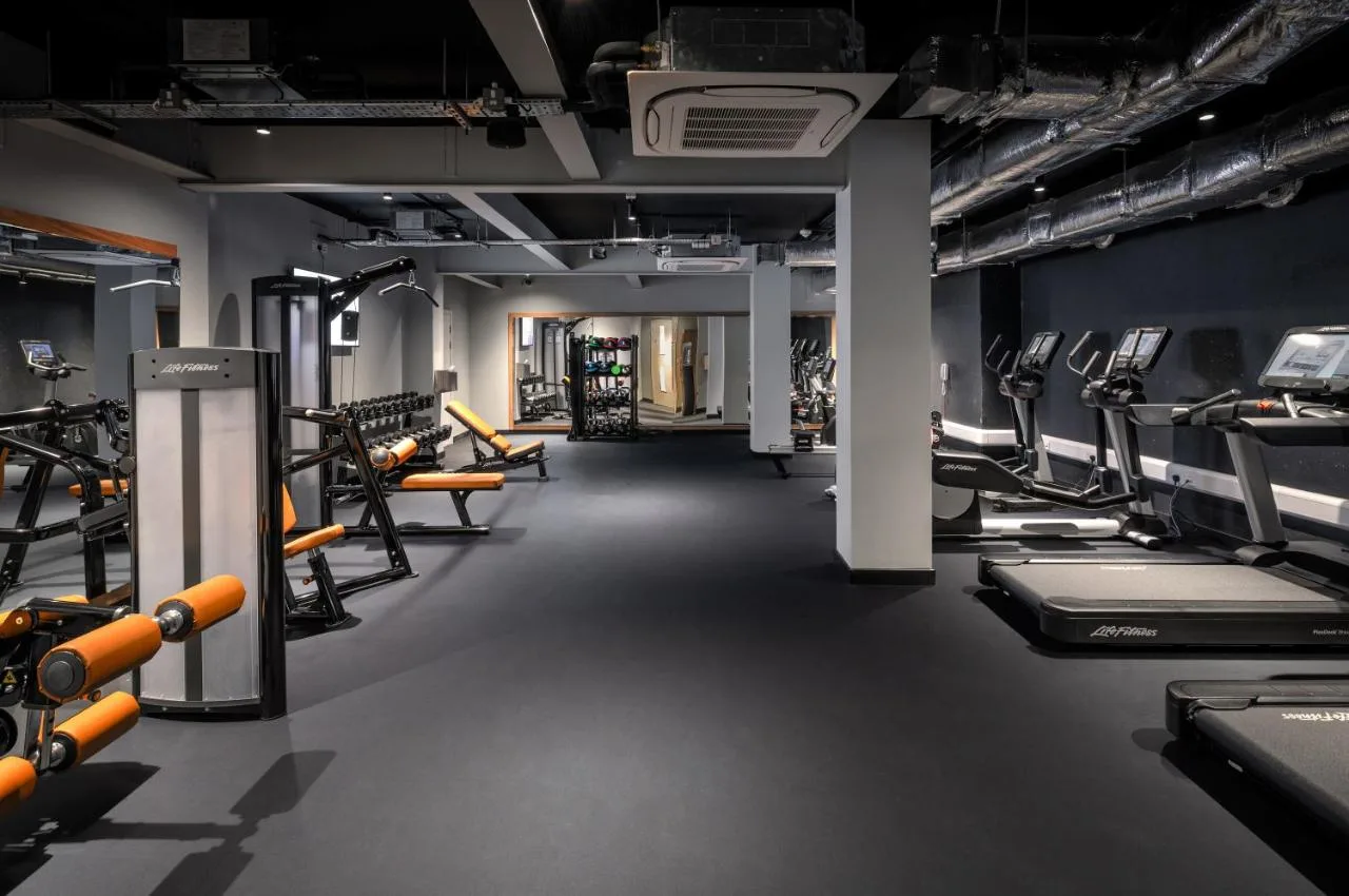 a gym with lots of treadmills and machines at Yotel Edinburgh in Edinburgh